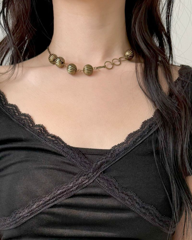 POKKI（ポッキ）の「[MADE] Stripe Ball Necklace (gold)（Accessories）」