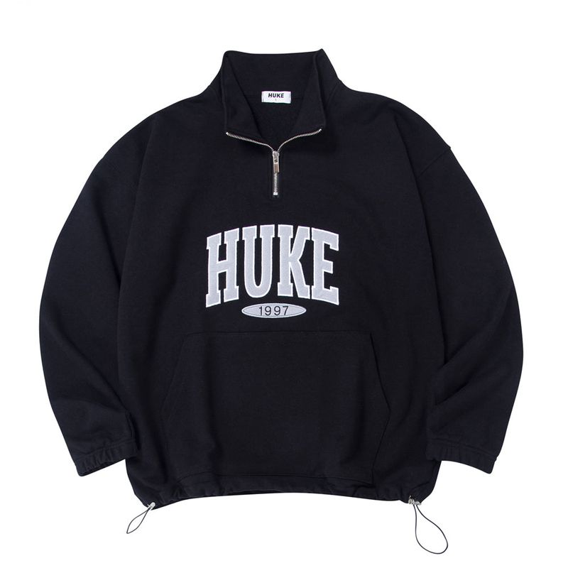 HUKE（フック）の「HUKE ロゴ ブラック ハーフ ジップアップ MTM（トップス）」