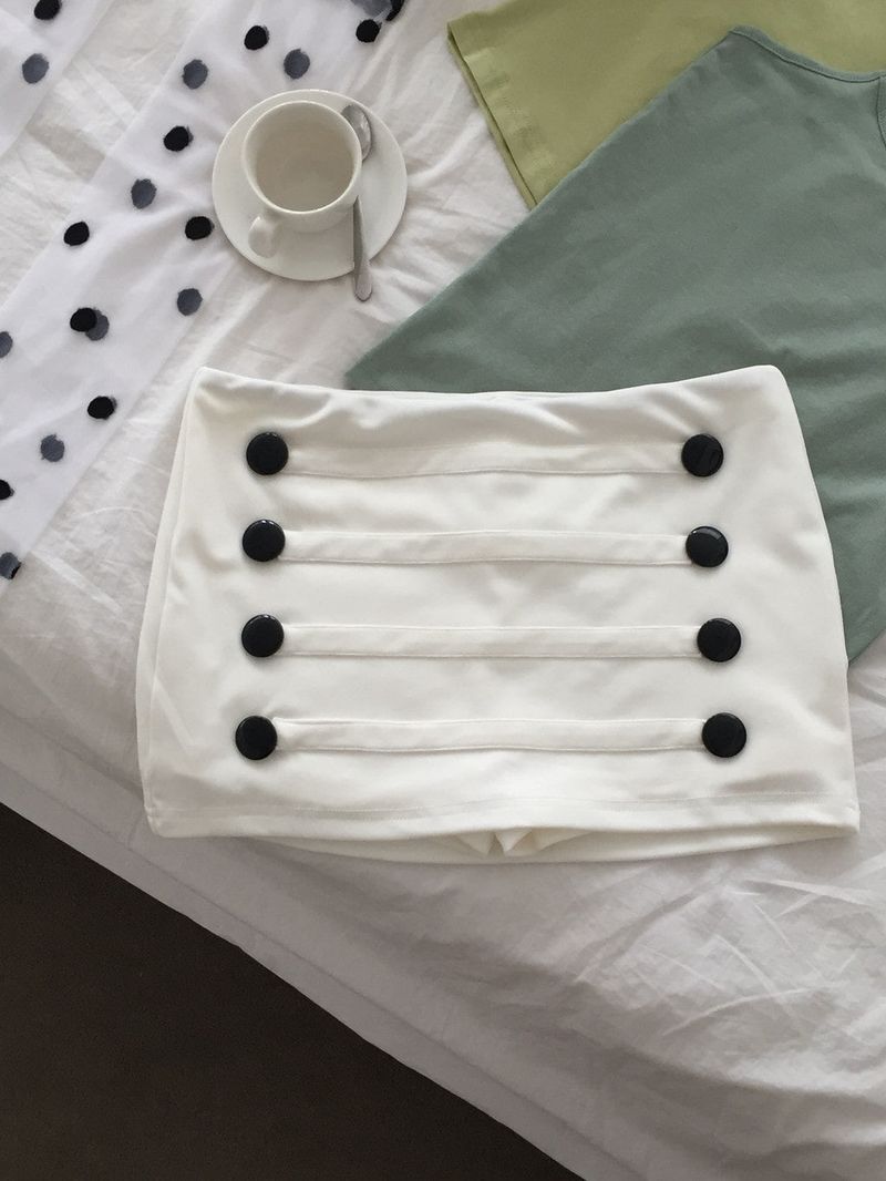 onthenextpage（オンザネクストページ）の「White Napoleon Mini Skirt（Skirts）」