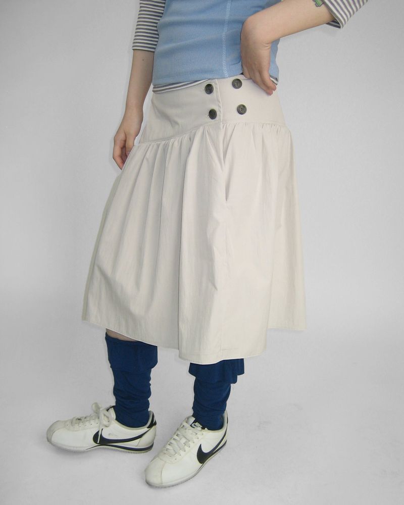 SLOW BUTTON FLARE MIDI SKIRT