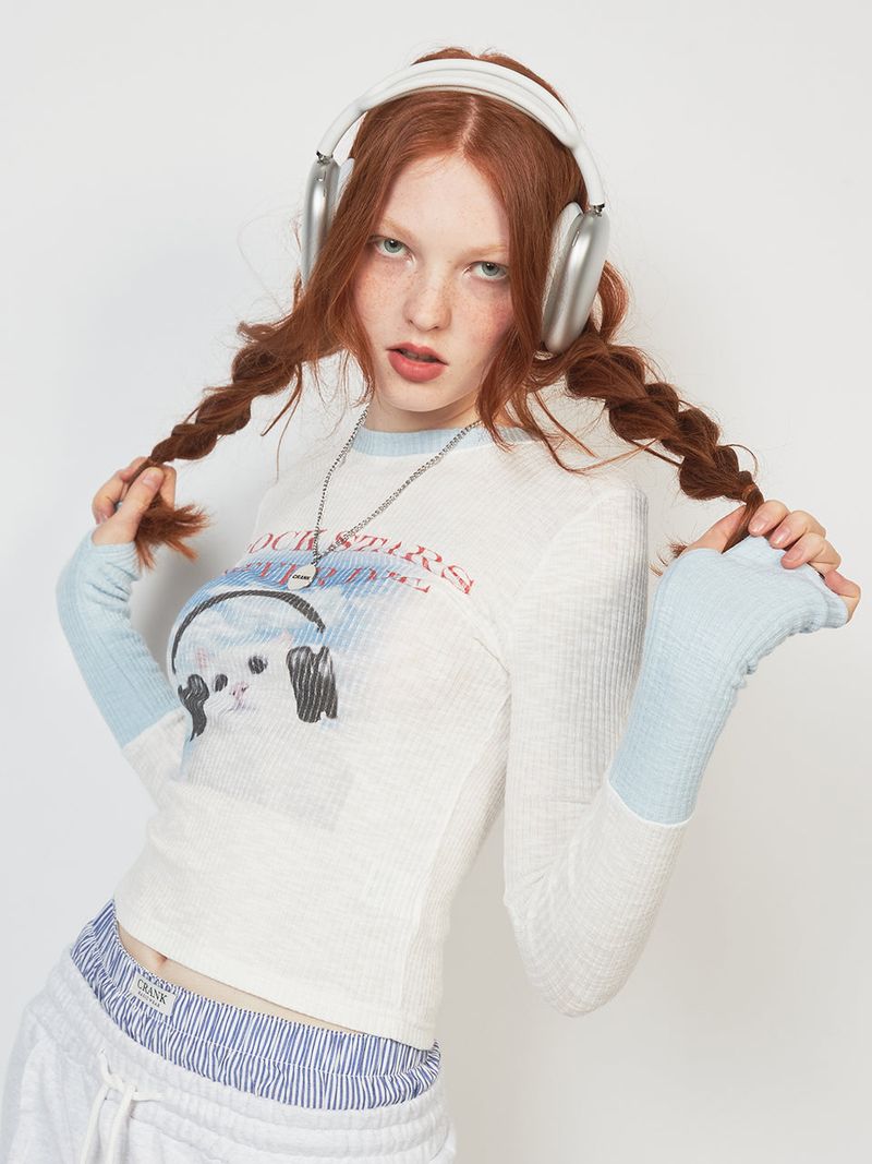 crank（クランク）の「RIBBED WARMER PRINT TOP_SKY（Tops）」