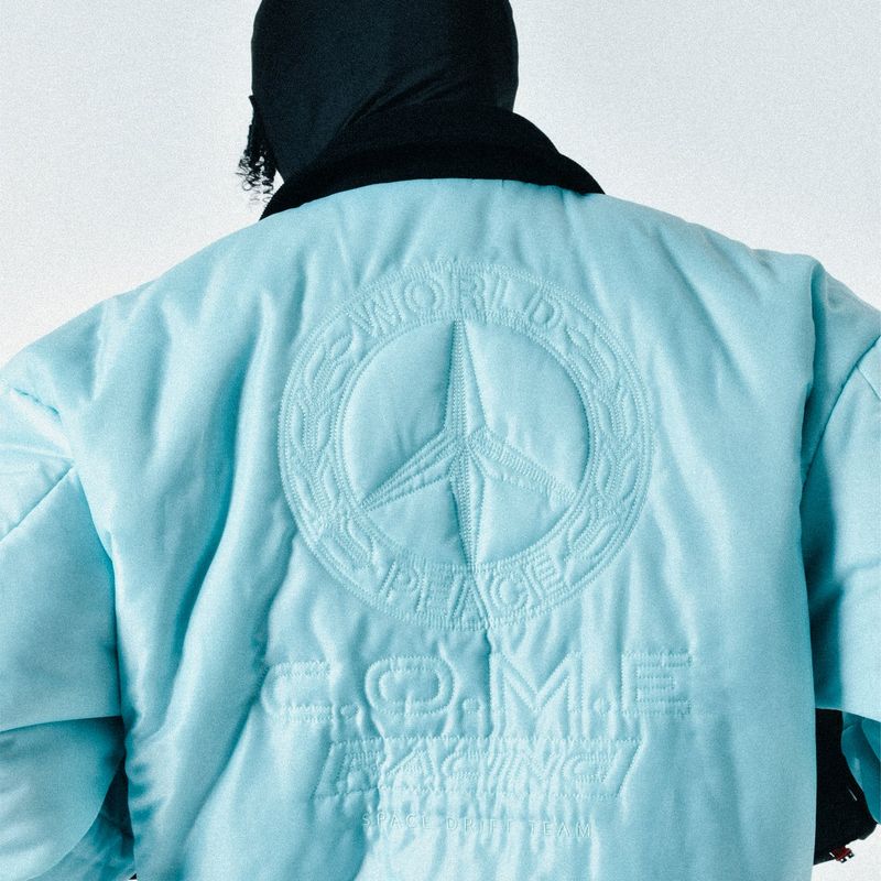 C.O.M.E（シーオーエムイー）の「[UNISEX] Reversible "WORLD PEACE" Padded Bomber Jacket (Blue Mint)（Jackets/Outerwear）」