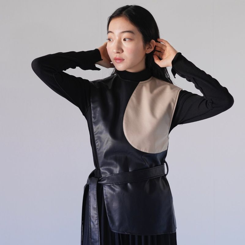 patchwork fake leather vest
