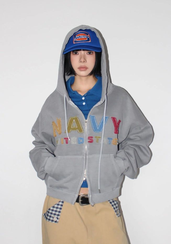 AAKE（アケ）の「KITSCH APPLIQUE HOODIE（Tops）」
