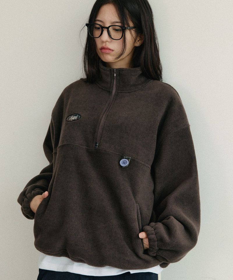 kijiko（キジコ）の「フリースボタンアノラック アッシュブラウン（トップス）」