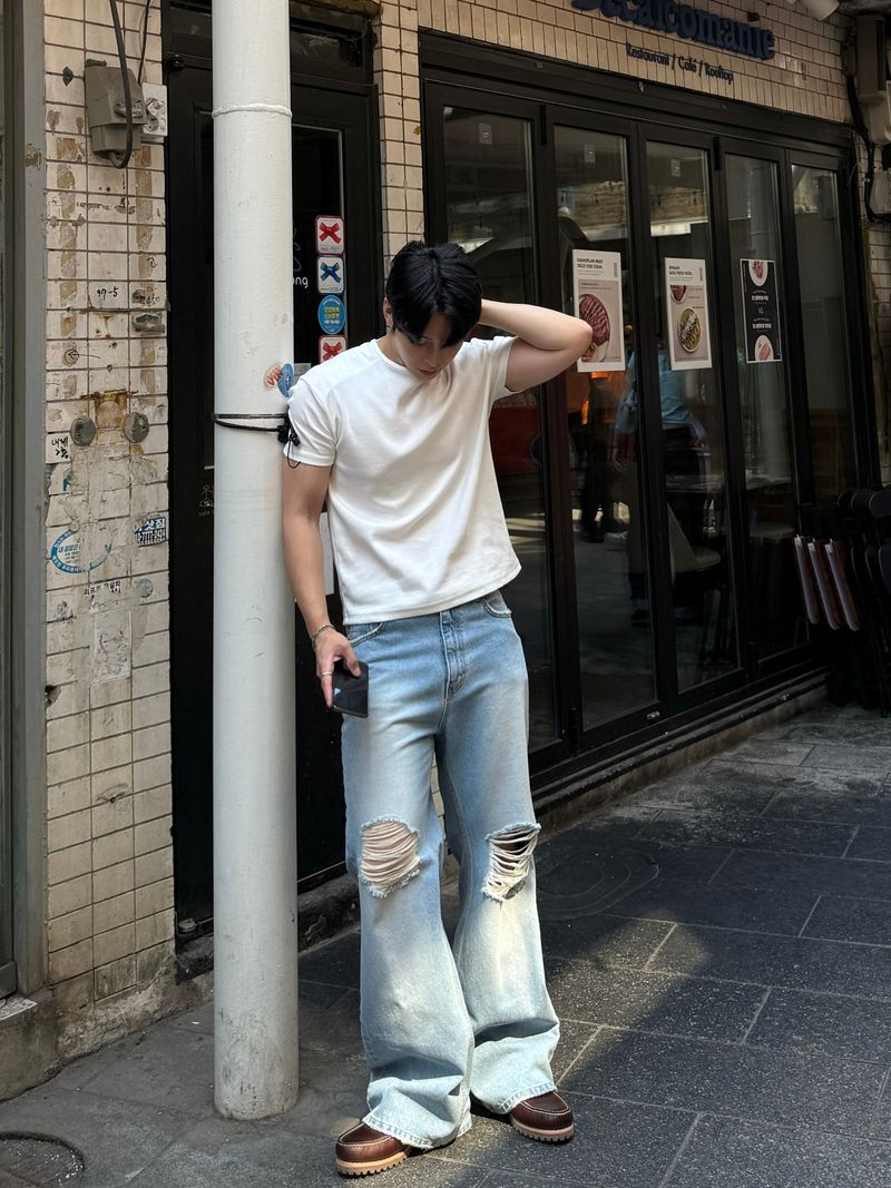 Curred destroyed flare denim pants