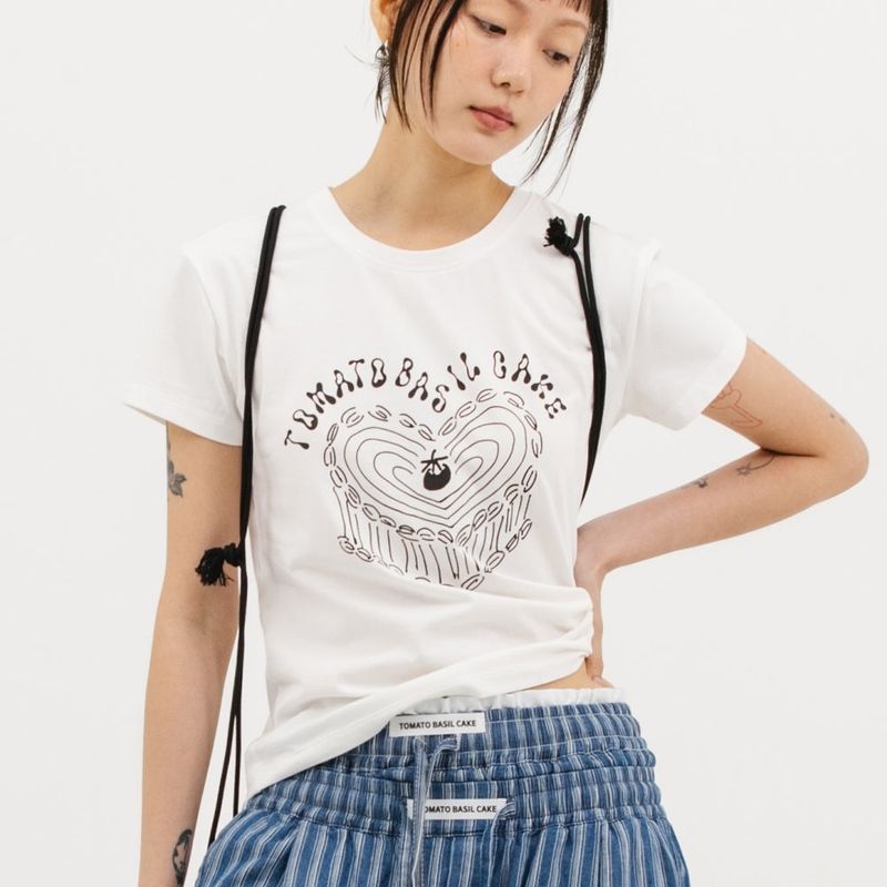 MATT AND MEL（マットアンドメル）の「[TOBAKE] ラブケーキTシャツ（トップス）」