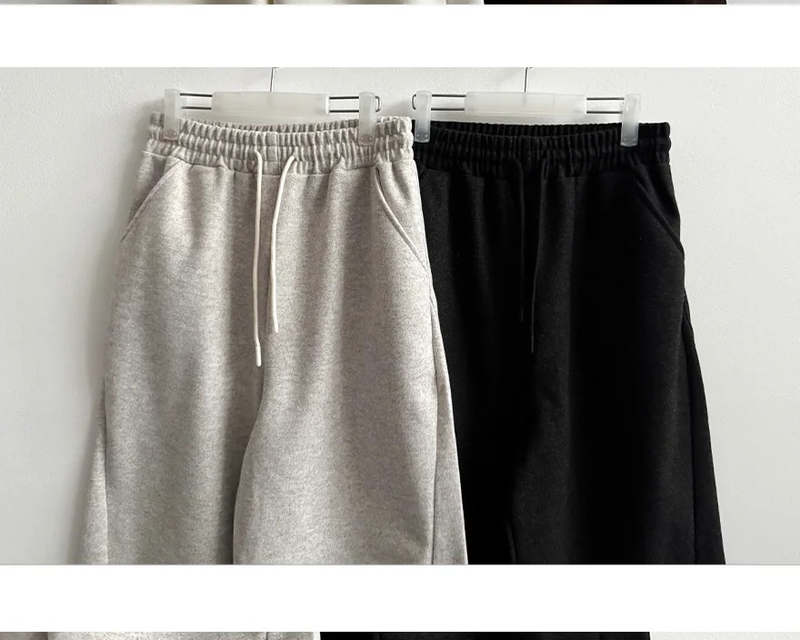Mende Curved Incision Woolen Wide Pants