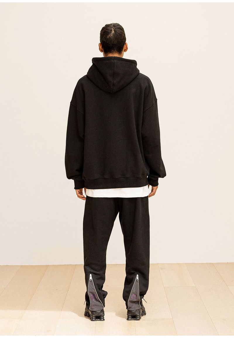 GRATING EMBLEM BACK SLIT ZIP PANTS