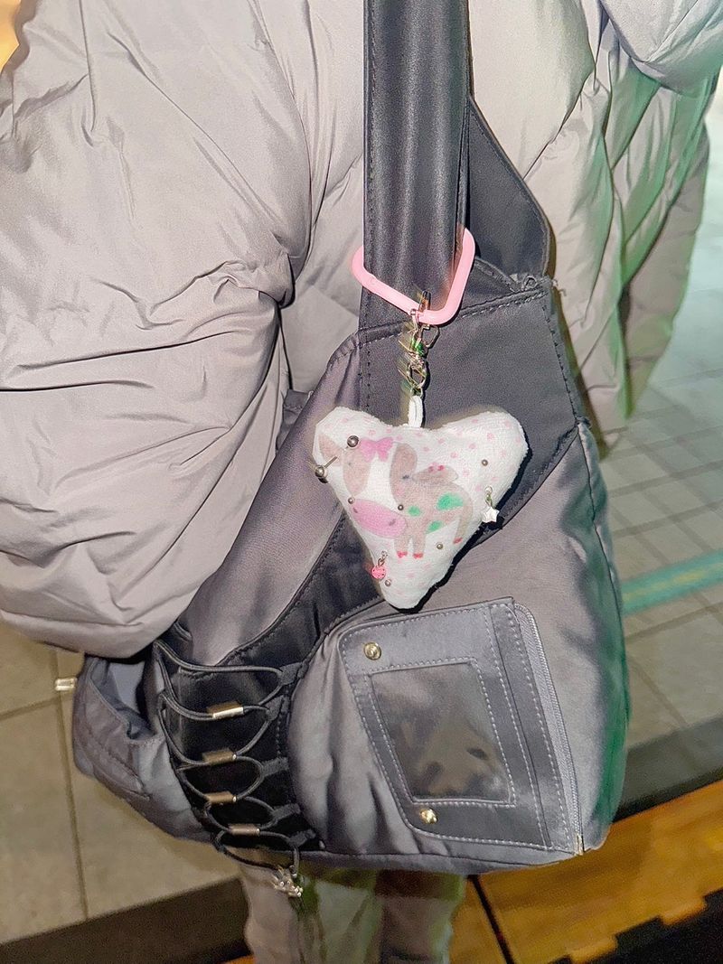 Pierced pinky cow keychain