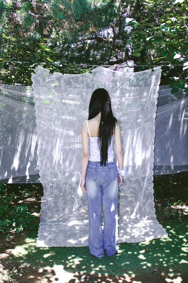 LACE VINTAGE WASHED BOOTCUT DENIM PANTS
