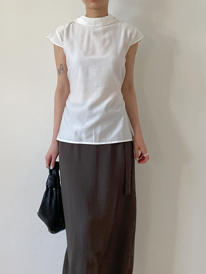 INCHANT ME（インチャントミー）の「Tie-neck Strap Cap Sleeve Blouse（Tops）」