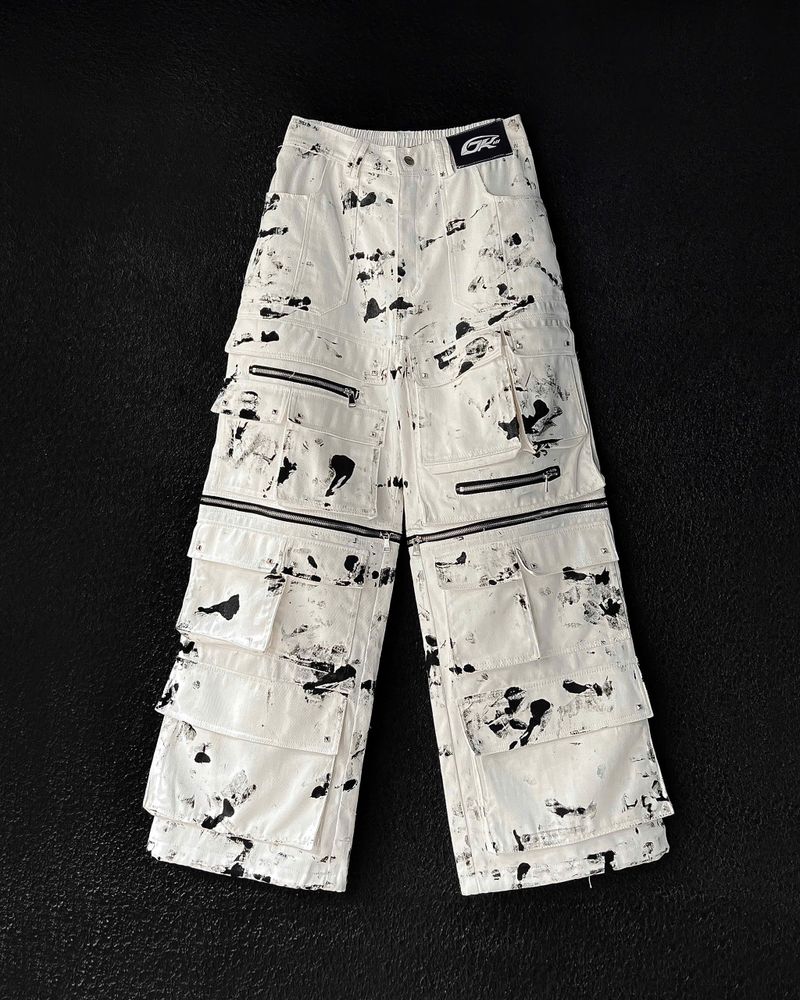DKILLUMINATE（ディーケーイルミネイト）の「WASH-DENIM CARGO PANTS MULTI POCKET (White)（Pants）」