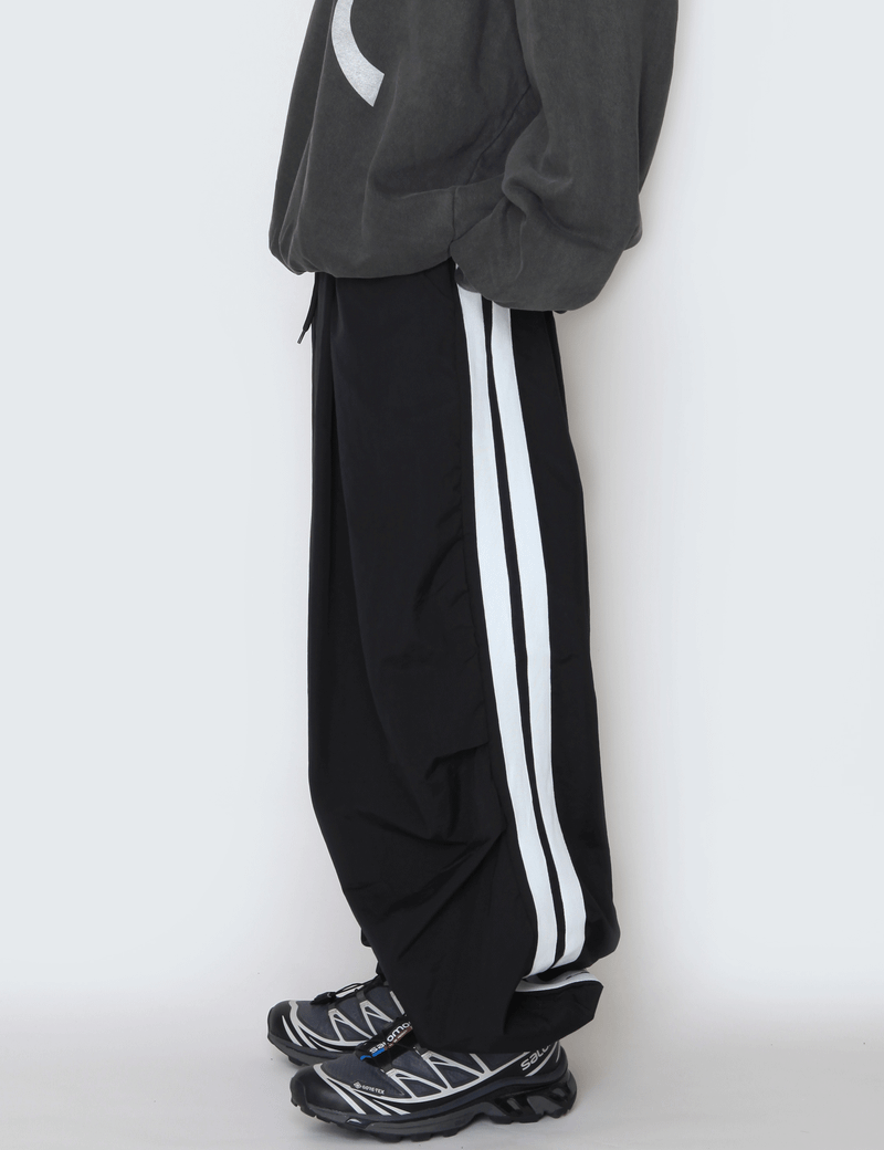 nutellike(ヌテールライク)の「Big Line Nylon Pants(Pants)」