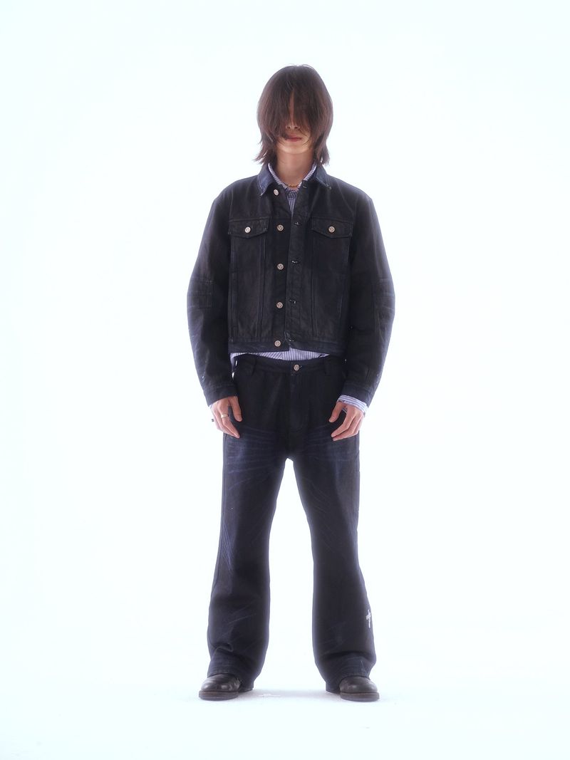 COATED KNIFE-SCRAPED HAND-WIPED DISTRESSED BOOTCUT JEANS