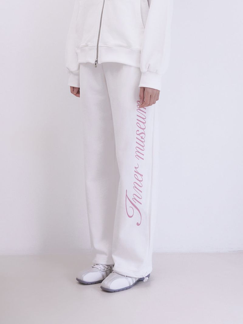 Innermuseum（インナーミュージアム）の「Inner Museum Lettering two-way Sweatpants (IVORY)（Pants）」