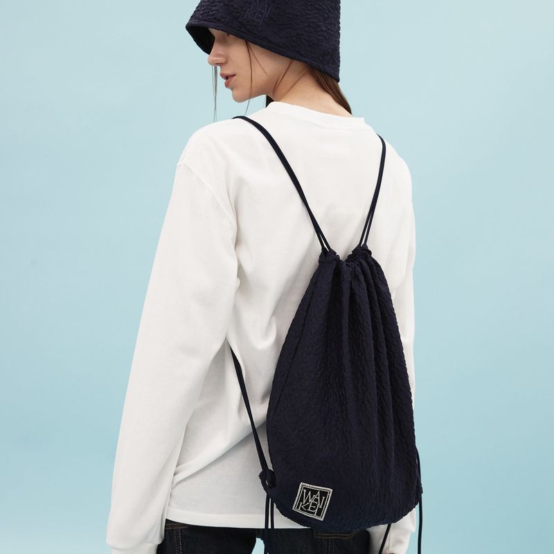 Embossing texture string bag