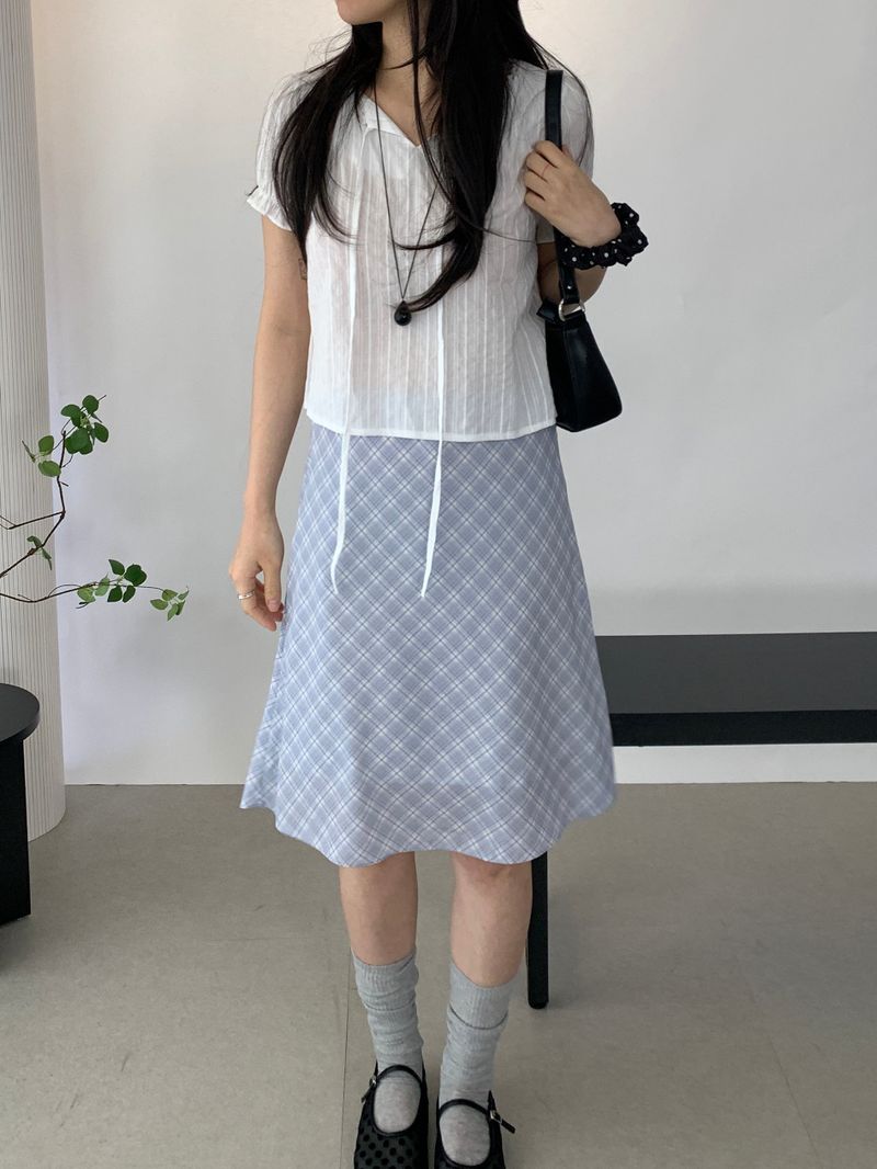Sovy check flare midi skirt