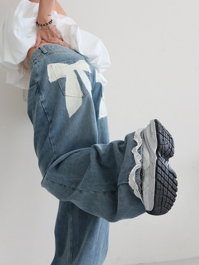 Delight-J（ディライトジェイ）の「ribbon frill wide denim jeans（Pants）」