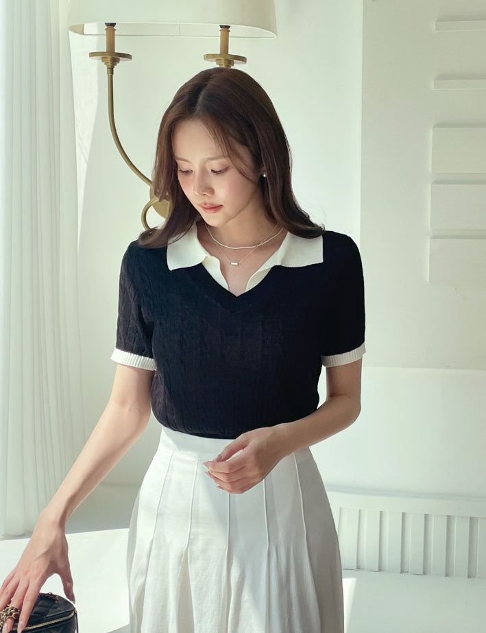 iam mari（アイアム マリ）の「Rael Cable Color Matching Open Collar Knit（Tops）」
