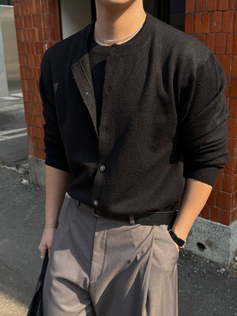 AVAND(アバンド)の「Doom knit layered cardigan(Tops)」