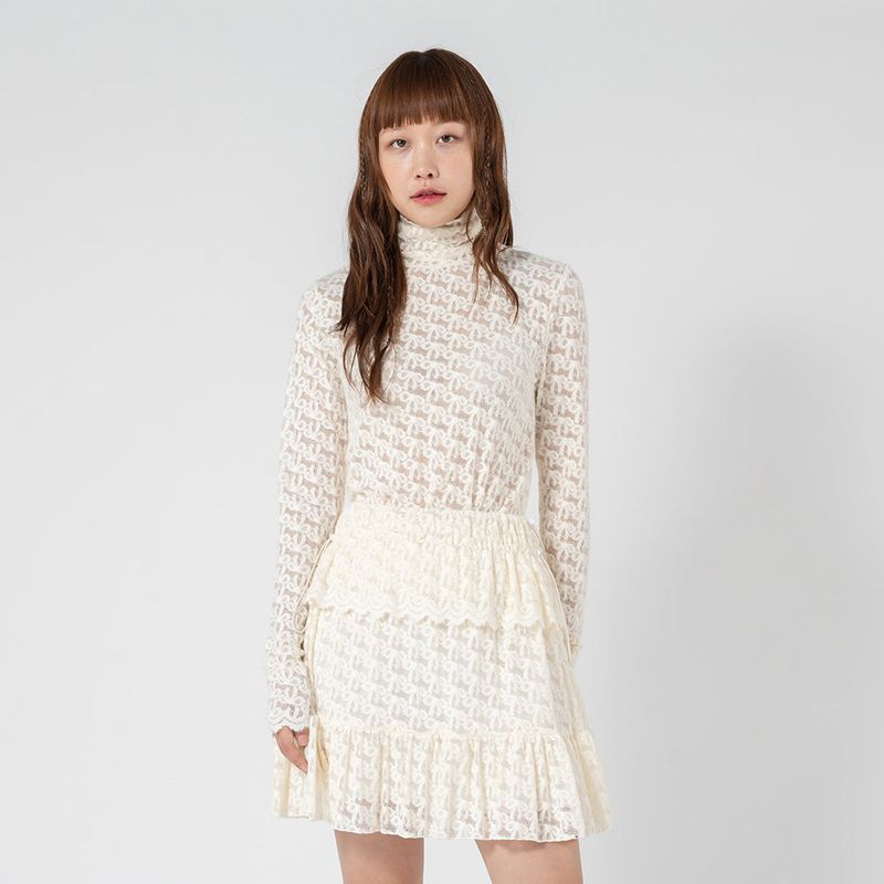 UNUSUALNORMAL（アンユージュアルノーマル）の「RIBBON HIGH-NECK T-SHIRT_CREAM（Tops）」