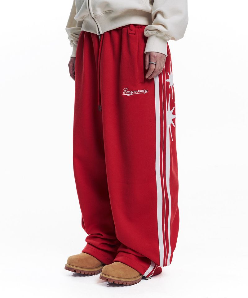 EASY NO EASY(イージーノーイージー)の「Star Piping Track Balloon Sweat Pants - Red(Pants)」