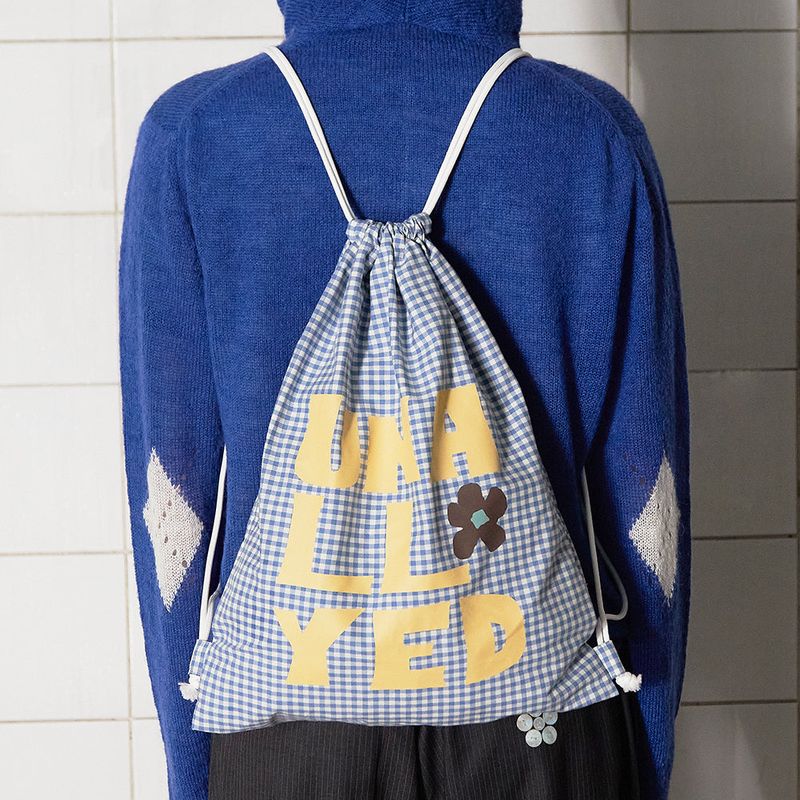 UNALLOYED（アナロイド）の「LOGO GINGHAM CHECK GYM SACK / BLUE（Bags）」