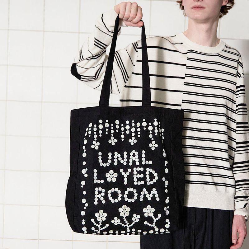 UNALLOYED（アナロイド）の「BUTTON LOGO ECO BAG / BLACK（Bags）」