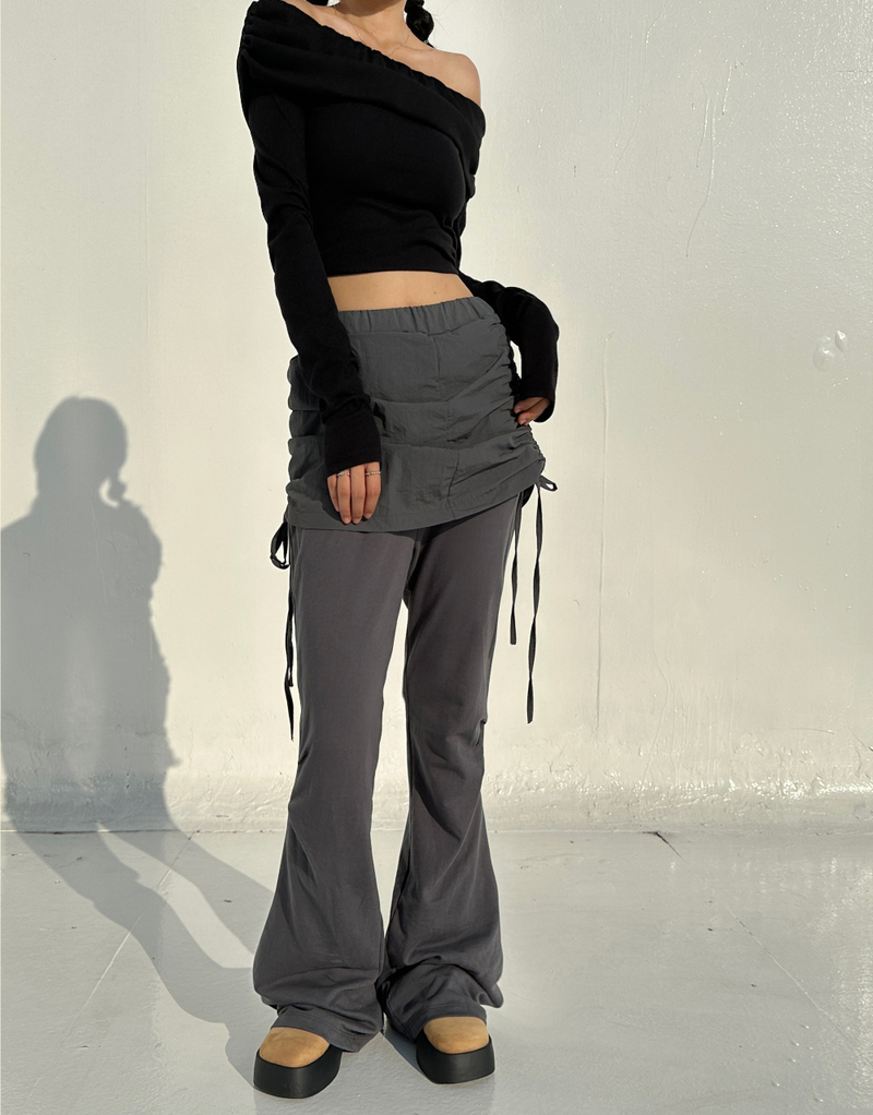 CCORTTI（コルッティ）の「CRINKLE BOW PLEATED TWO-LAYER コットンブーツカットトレーニングスカートパンツレギンス - 2 COLOR（パンツ）」