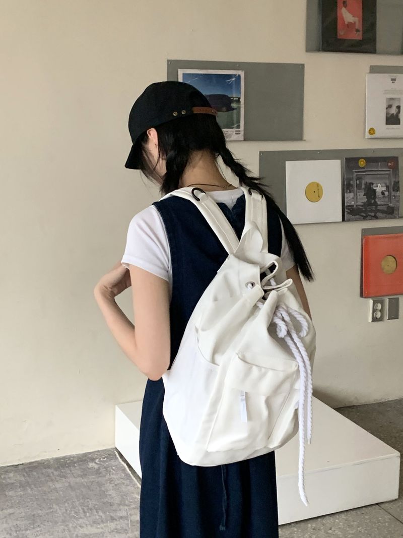 WONDER WONDER（ワンダーワンダー）の「Paon Two-Pocket String Canvas Cotton Backpack（Bags）」