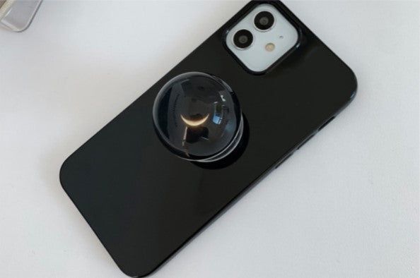 withsome（ウィズサム）の「Half Moon - ブラックスペースマホグリップ（スマホグッズ/小物）」