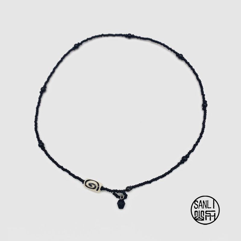 sanli（サンリー）の「Spiral necklace (black)（Accessories）」