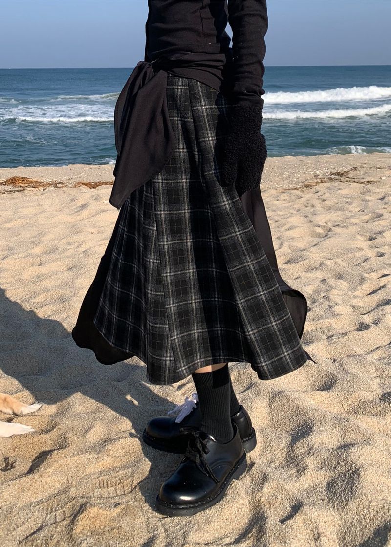A BLACK CHECK SKIRT