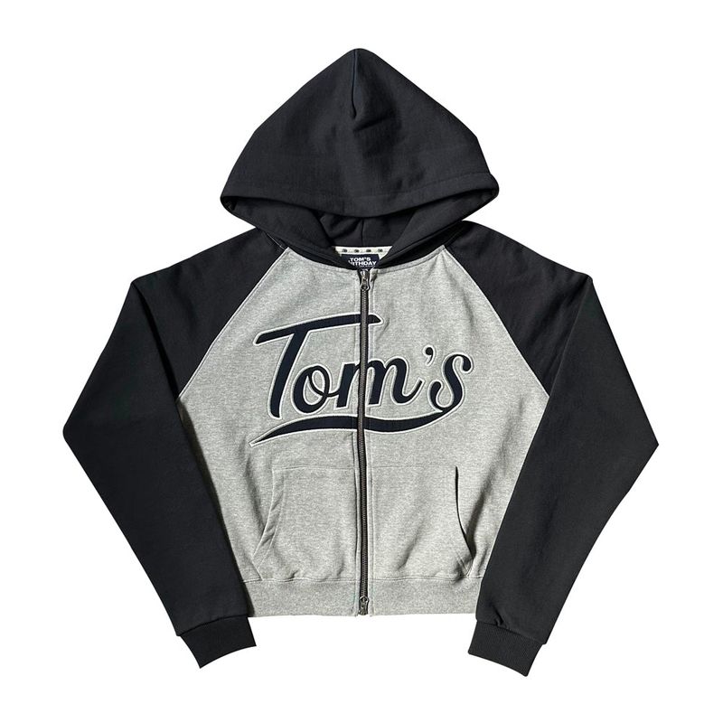 TOM'S BIRTHDAY（トムズバースデー）の「TOMS RAGLAN MIX HOOD ZIPUP NAVY（Tops）」