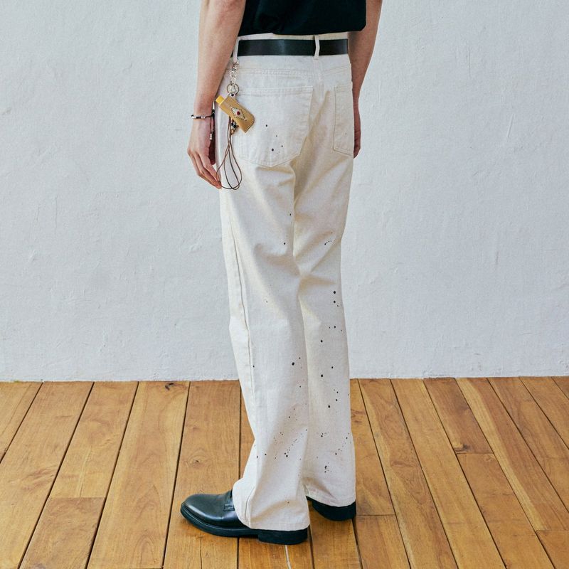 97 lc splatter bootscut denim pants ecru