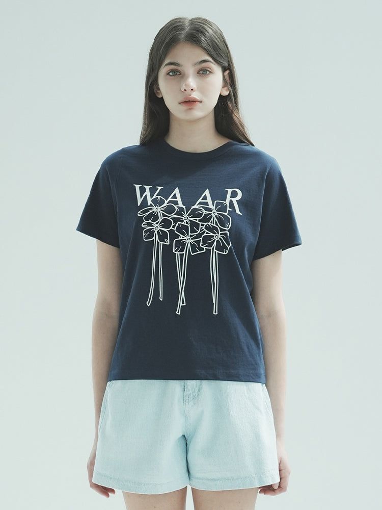 WAAR(ワル)の「T1009 W FLOWER T-SHIRT_NAVY(Tops)」