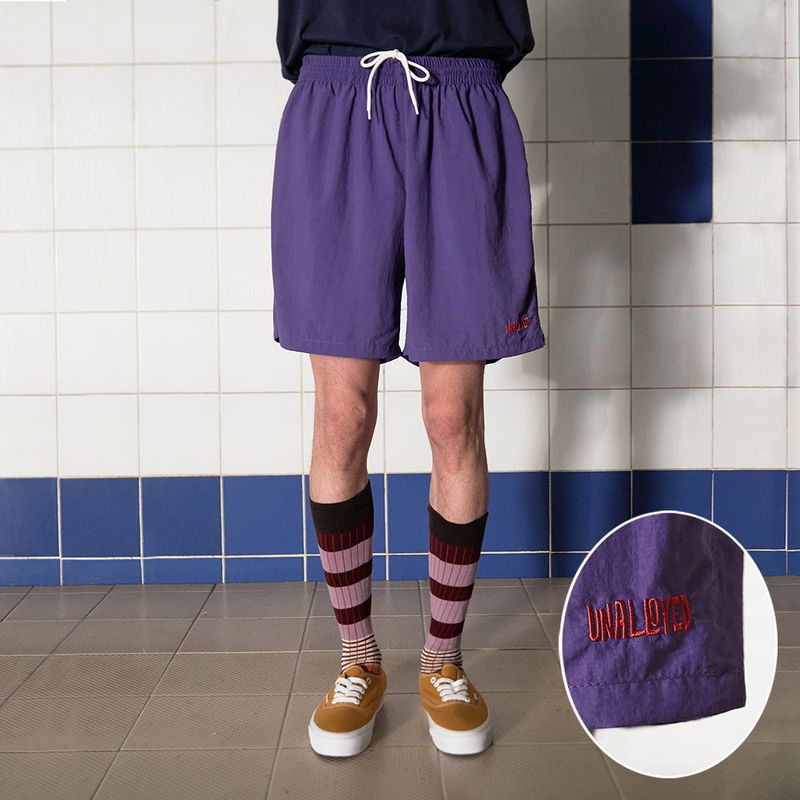 UNALLOYED(アナロイド)の「LOGO NYLON SHORT / PURPLE(Pants)」