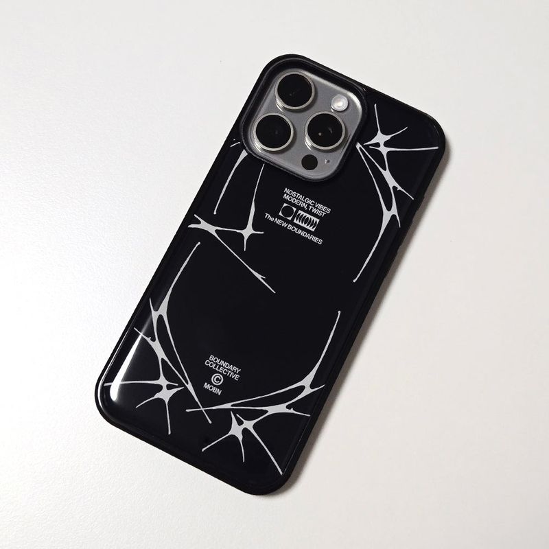 MEMORIESBOUNDARY(メモリーズバウンダリー)の「The New Boundaries Phone Case (BK)(Smartphone Accessories)」