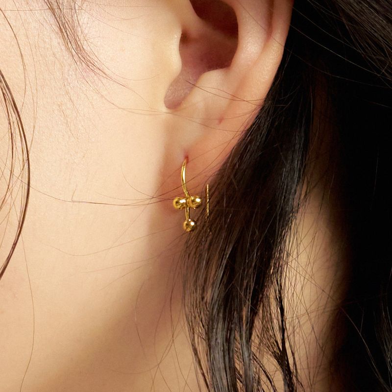 geegee(ジジ)の「petit flower earring - gold(Accessories)」