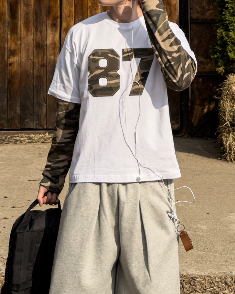 JIIGEUM(ジグム)の「Camber Camo Layered Long Sleeve T-Shirt(Tops)」