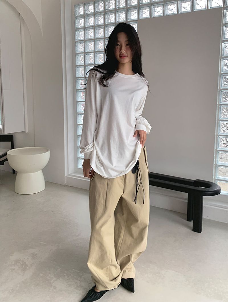 CURVED TUCK COTTON TROUSER