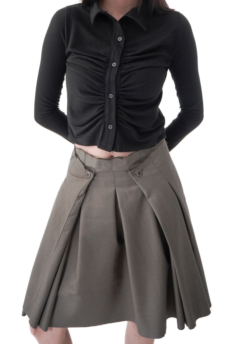  UNTAMED PLEATS SKIRT