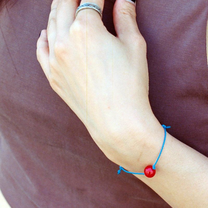 RED BALL ROPE BRACELET