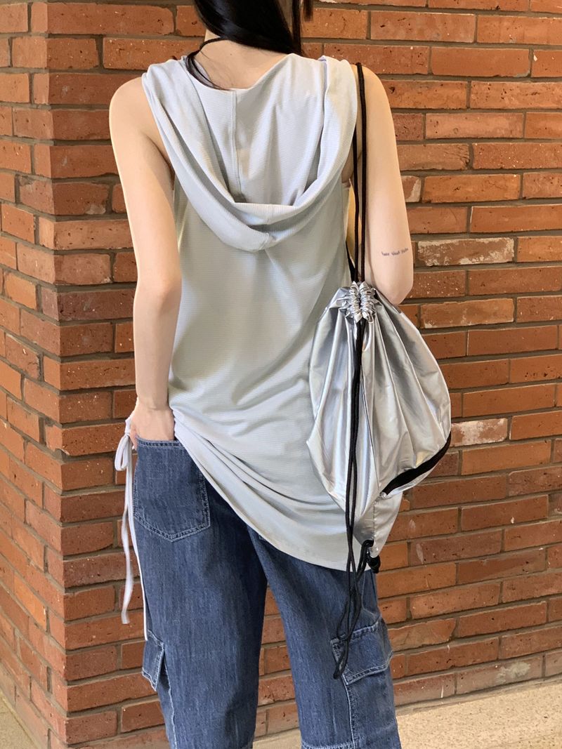 WONDER WONDER(ワンダーワンダー)の「Shaket Glossy Metal Glossy String Backpack(Bags)」