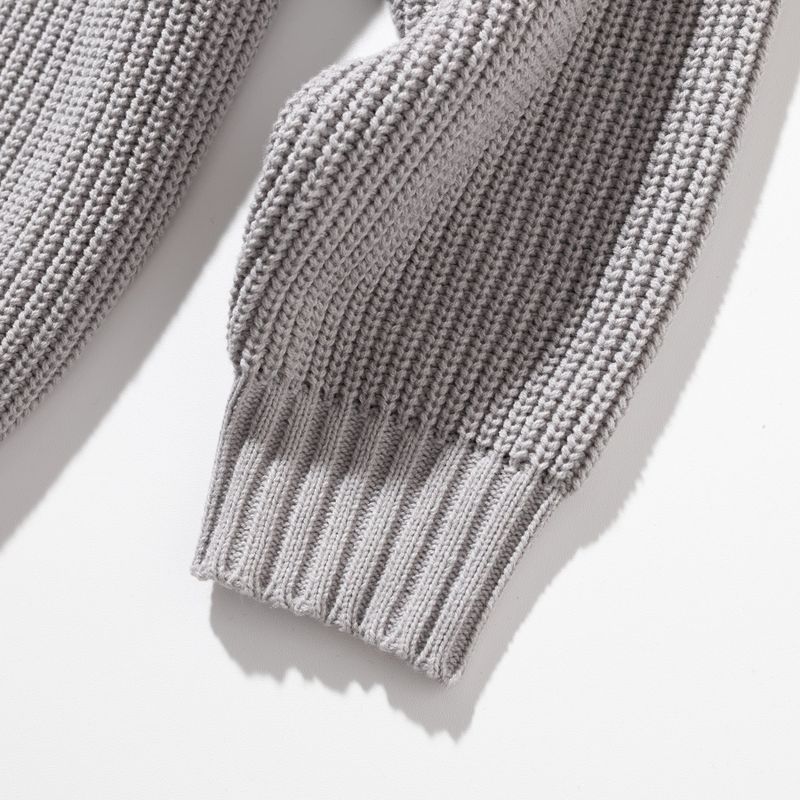 HALF INCISION OVERSIZED KNIT