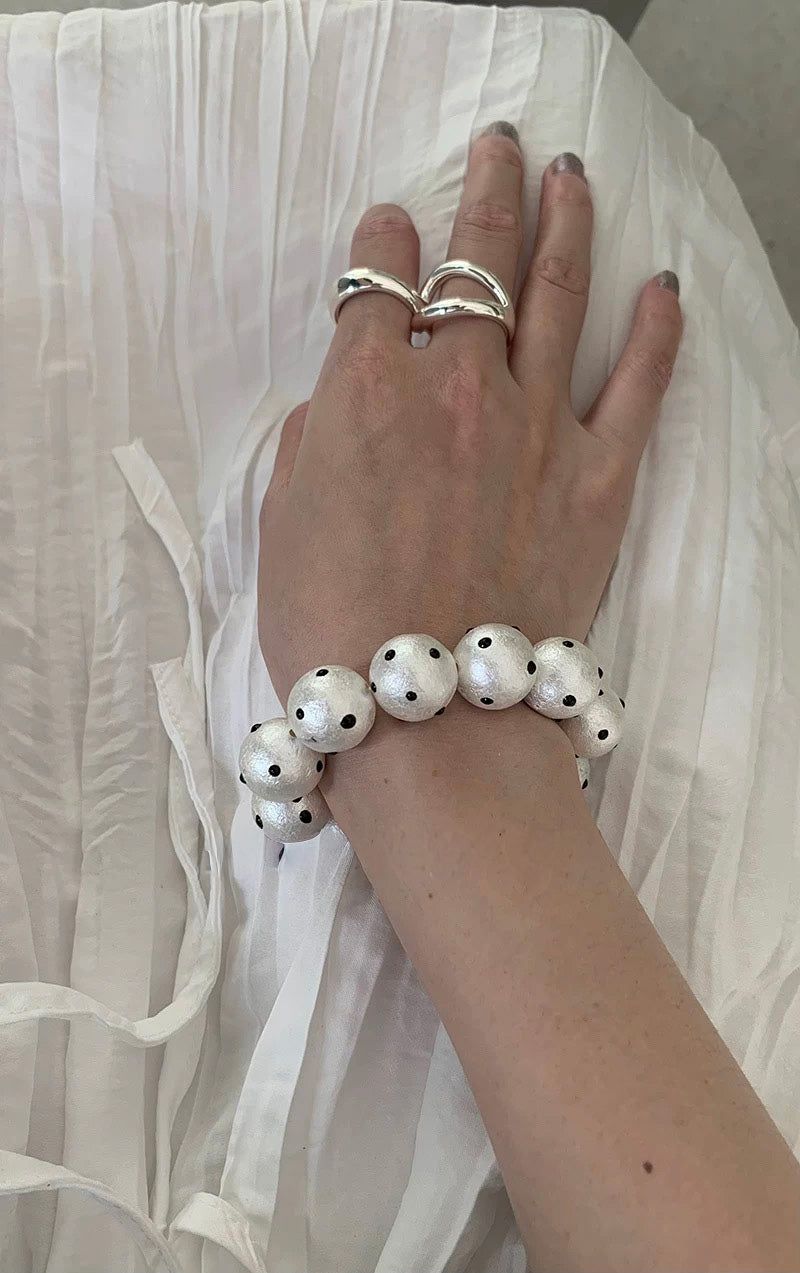 Matt white dot bangle