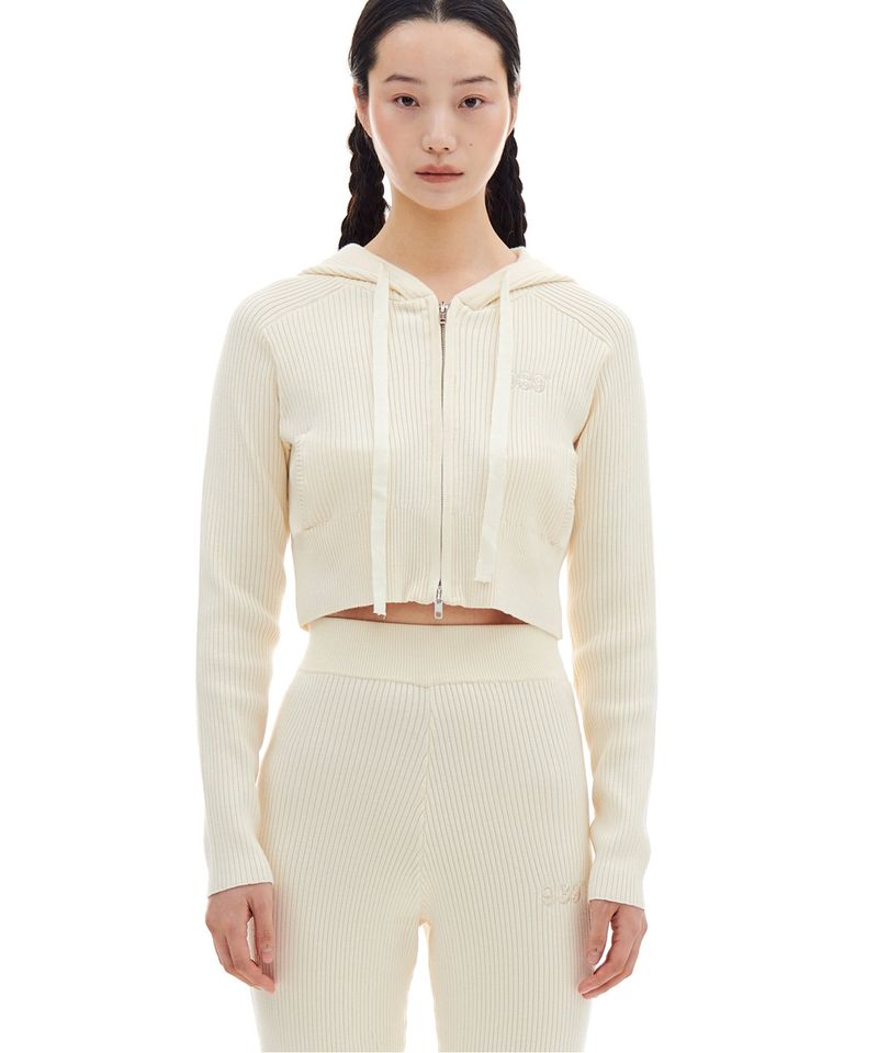 ARCHIVE BOLD（アーカイブボールド）の「SMALL LOGO CROP KNIT HOOD ZIP-UP (CREAM)（Tops）」
