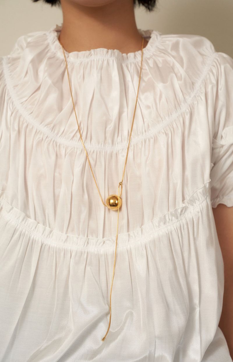 maxy moving ball necklace - gold