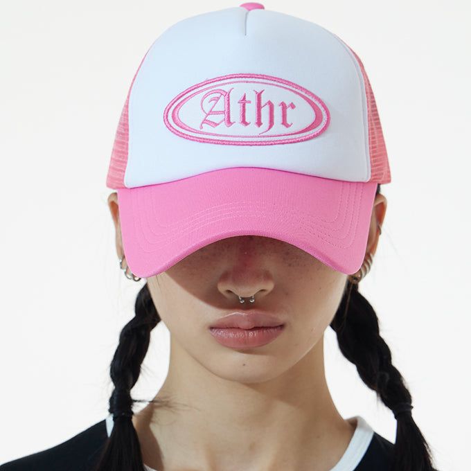 ANDTHEOTHER(アンドジアザー)の「PINK ATHR TRUCKER CAP(Hats)」